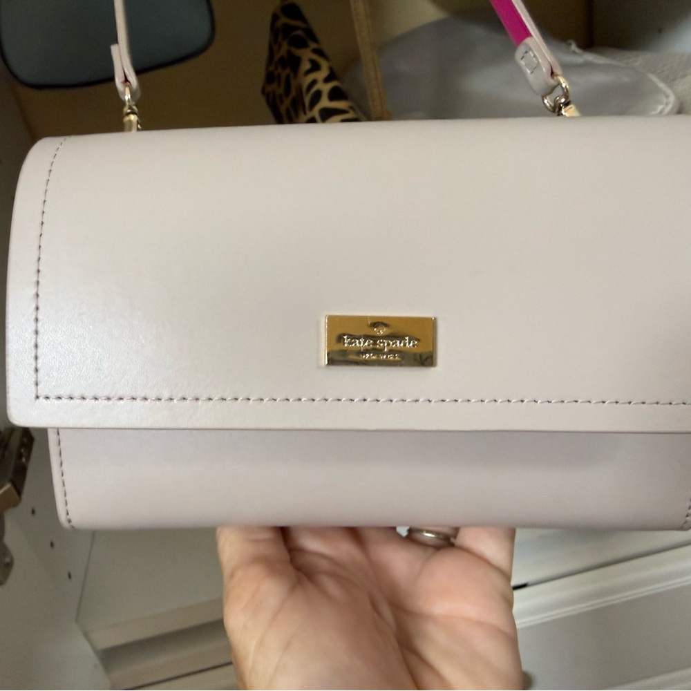 kate spade pale pink leather crossbody with gold plaque